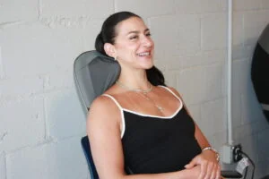 our tester is looking very relaxed while getting a shiatsu neck massage from a homedics massage chair