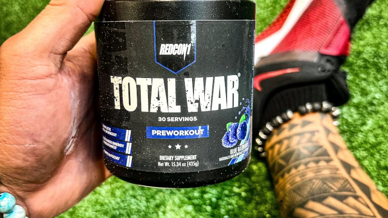 Stephen Sheehan, CPT, CNC, holds up his recommended pre-workout Total War