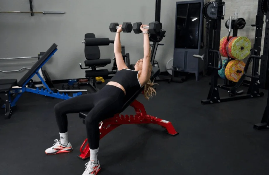 Our tester performing incline dumbbell presses on the Major Fitness Adjustable Bench