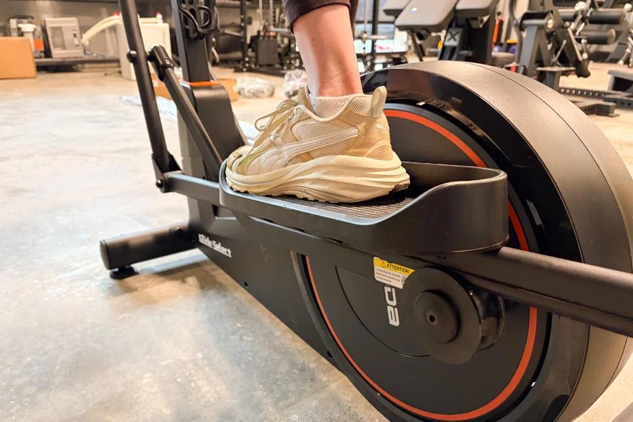 A close look at the pedals on a YOSUDA EM1 Long-Stride Magnetic Elliptical Machine