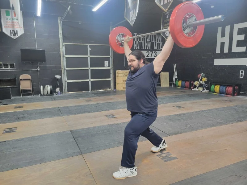 Olympian Caine Wilkes lifting in Tyr L2 Lifters