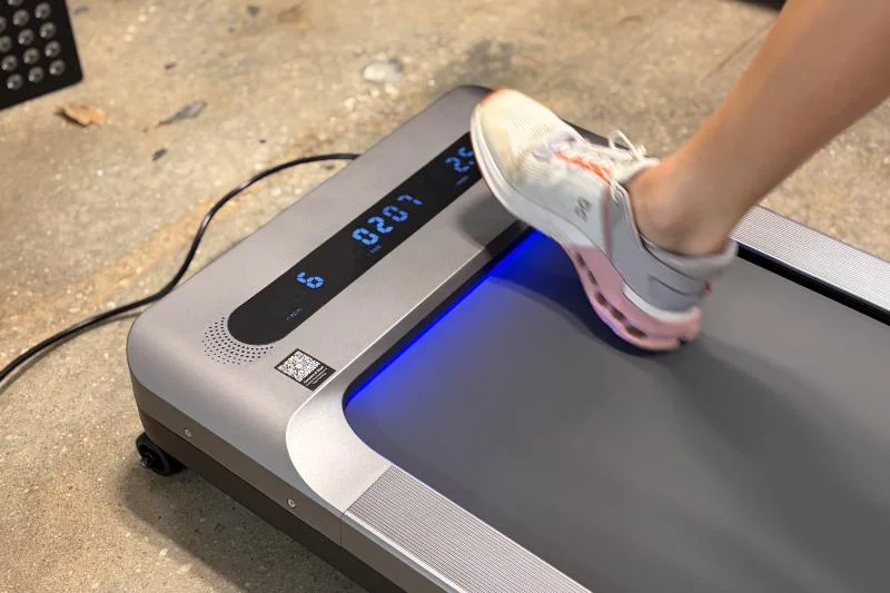 A person walking on the MERACH UltraWalk W60 Plus Walking Treadmill