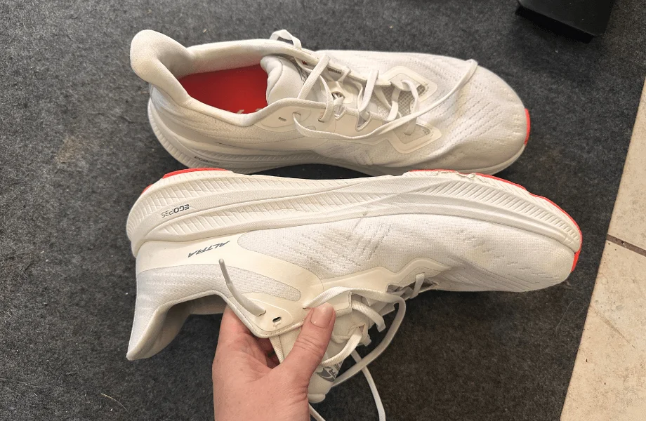 Our tester showcasing the upper of the Altra Experience Flow 2 running shoes