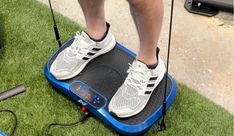 Testing the resistance bands on an AXV Vibration Plate.