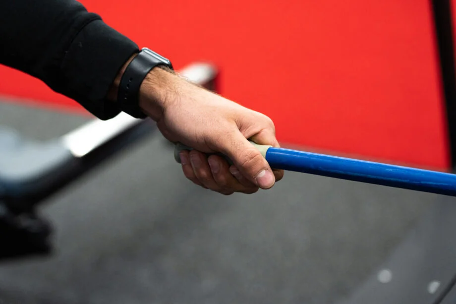 Hand grasping the Inertia Wave 