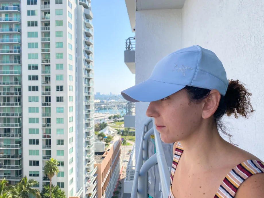 Woman wearing baby blue Arcteryx running hat