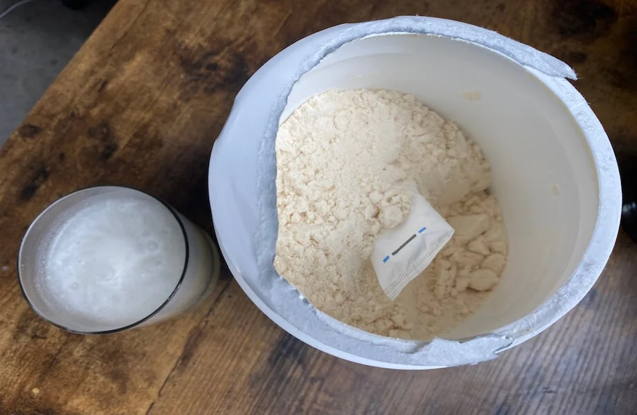 An open container of Primal Kitchen Collagen Peptides