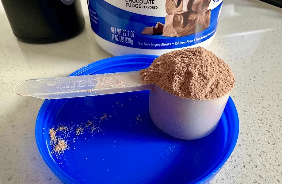 A full scoop of Orgain Grass-Fed Whey Protein
