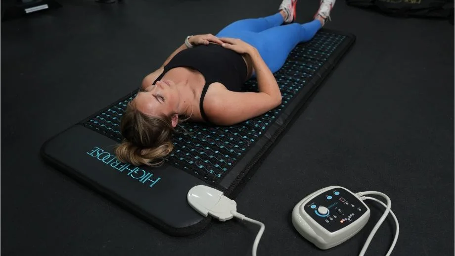 higher dose pemf mat top view from modles head laying on mat