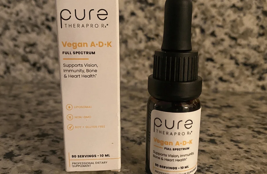Pure TheraPro Rx Vegan A-D-K Drops, unboxed, sitting on our tester's countertop