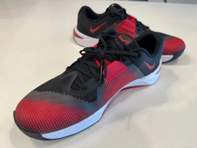 A pair of Nike Metcon 10 gym shoes