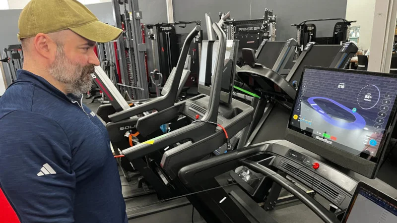 Our tester walking on a NordicTrack treadmill for testing in our equipment facility.