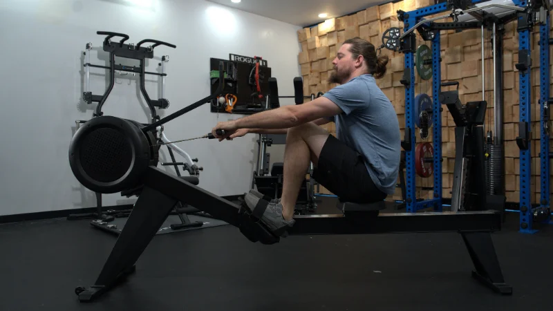 Our tester working out on the YOSUDA Air Magnetic Rowing Machine Pro