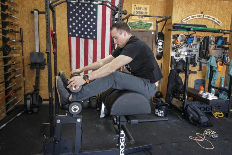 Coop doing GHD sit-ups