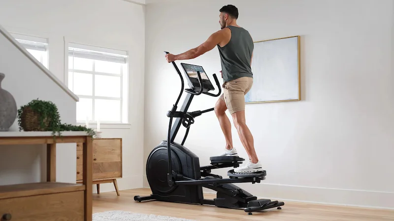 Man performs a workout on the NordicTrack AirGlide 16 Elliptical