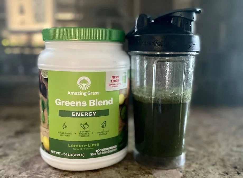 Amazing Greens energy blend in a clear shaker bottle