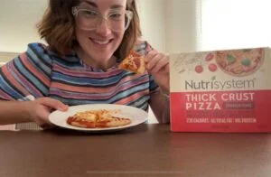woman holding nutrisystem pizza
