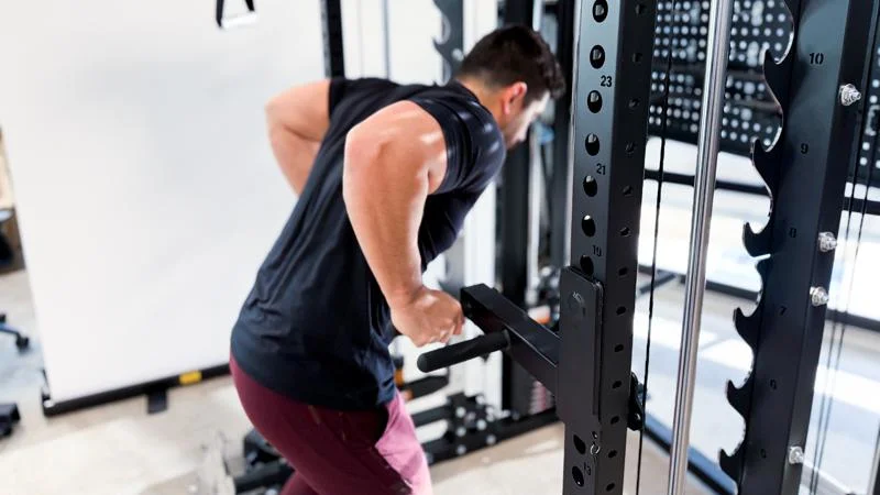 Our tester using the Major Fitness B17 Smith Machine