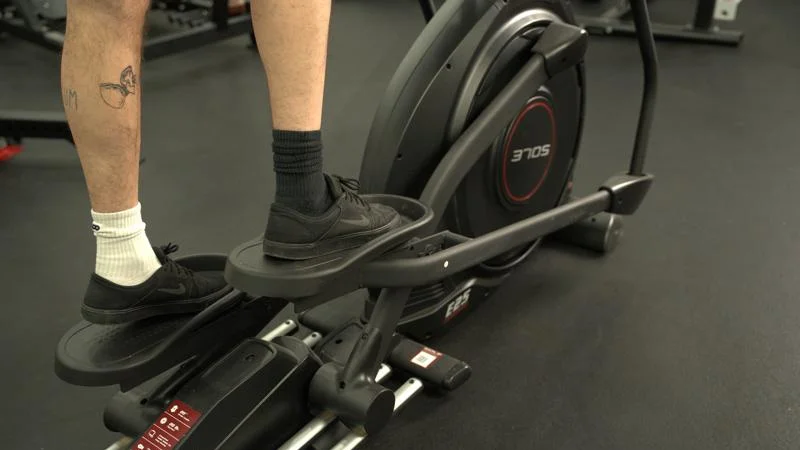 Pedals and flywheel on the Sole E25 Elliptical