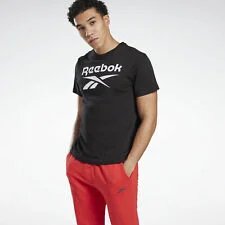 Man wearing a Reebok T-shirt and sweatpants