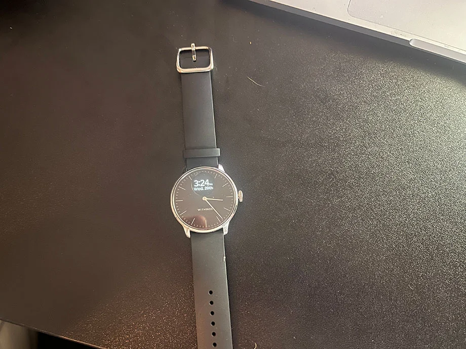 A Withings Scanwatch Light on a desk