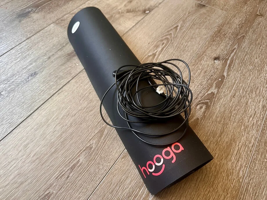 Hooga grounding mat rolled up on the floor