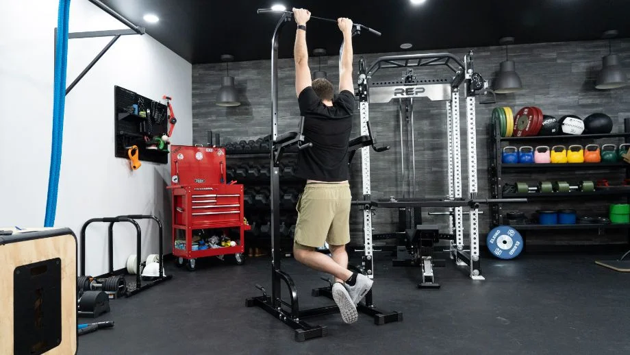 Man doing pull-ups on the Sportsroyals Power Tower