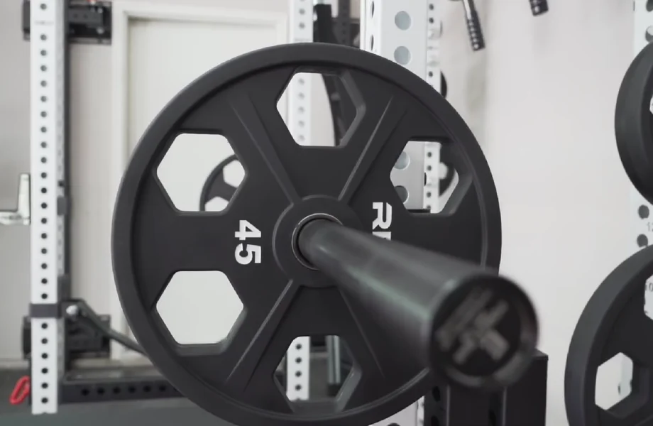 REP Fitness Equalizer Urethane-Coated Plates loaded onto a barbell