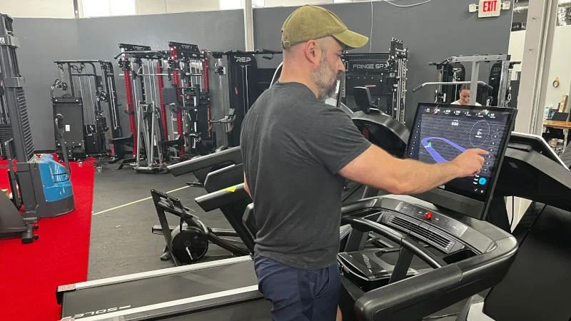 Our tester walking on a NordicTrack treadmill for testing in our equipment facility.