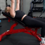 Our tester using the Major Fitness Adjustable Bench for a dumbbell workout