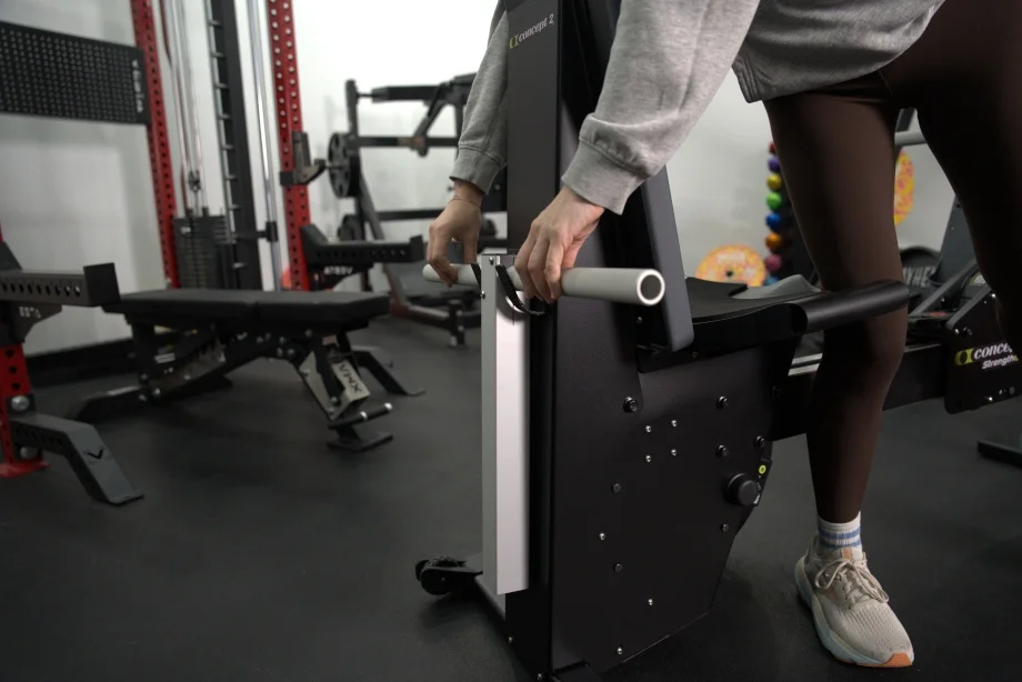 Our tester lifts the handle from its cradle on the Concept 2 Strength ERG