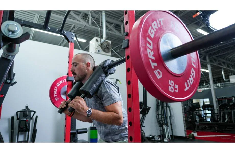 Titan Series Safety Squat Bar in use