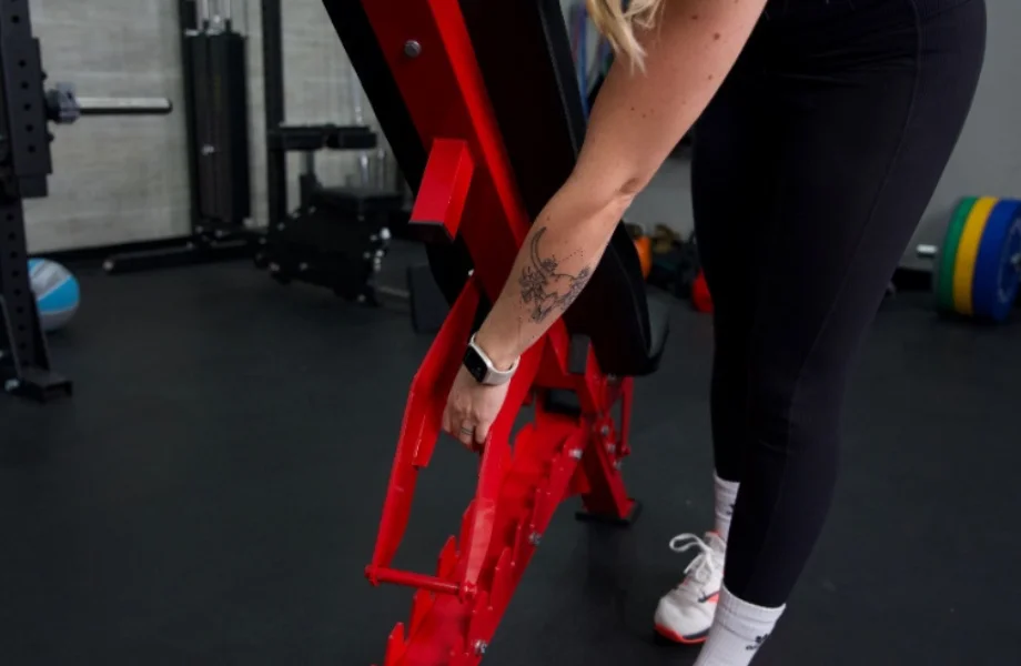 Our tester adjusting the back pad angle of the Major Fitness Adjustable Bench