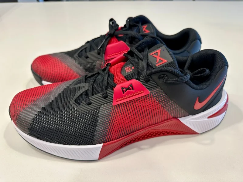 Side view of a pair of Nike Metcon 10 gym shoes
