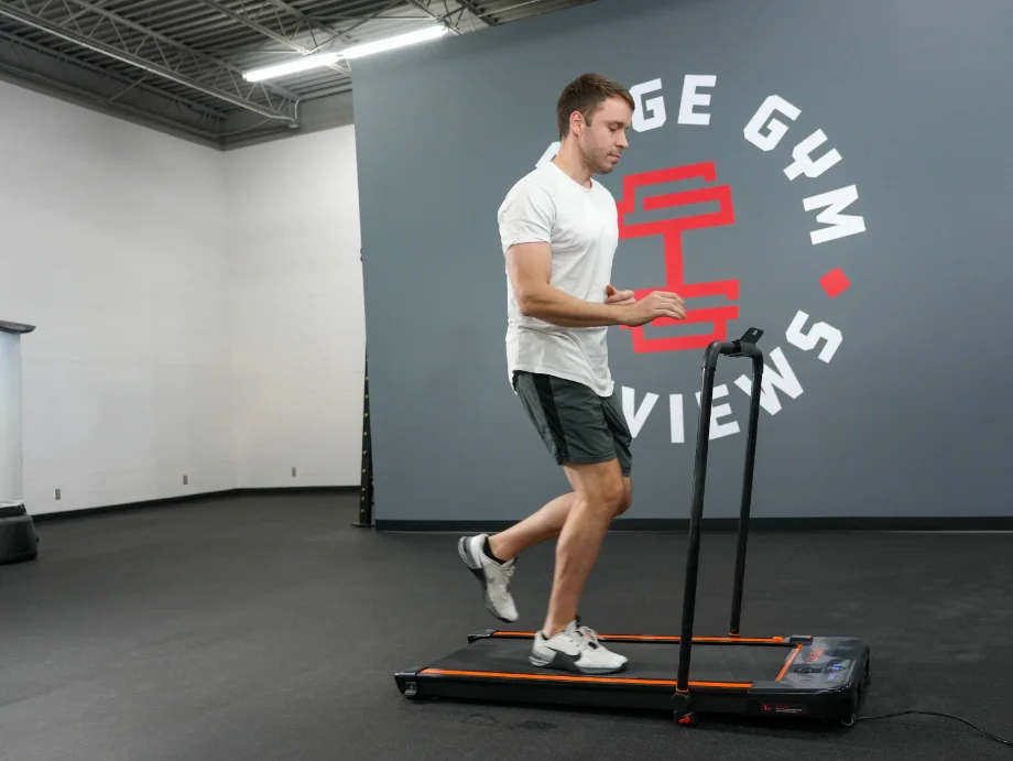 A man jogging on the UREVO 2-in-1 Treadmill