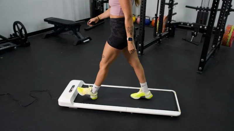 A woman walking on the WalkingPad C2