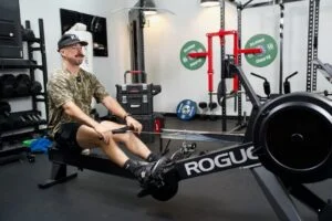 man using rogue echo rower