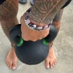 Our tester holding the Iron Bull Strength Kettlebell