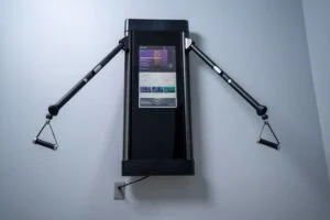 tonal hanging in a home gym