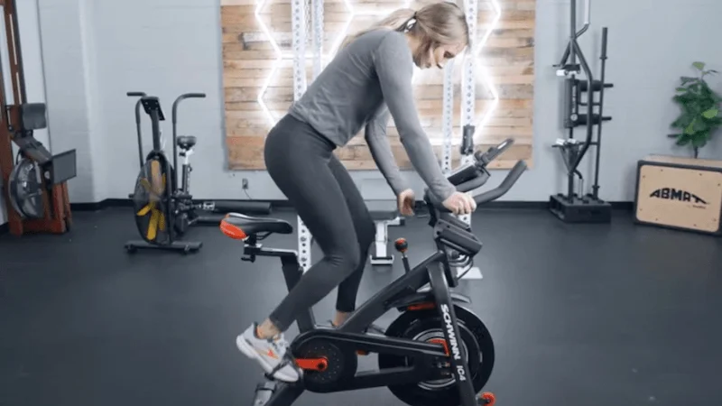 Our tester beginning their workout atop the Schwinn IC4 exercsie bike