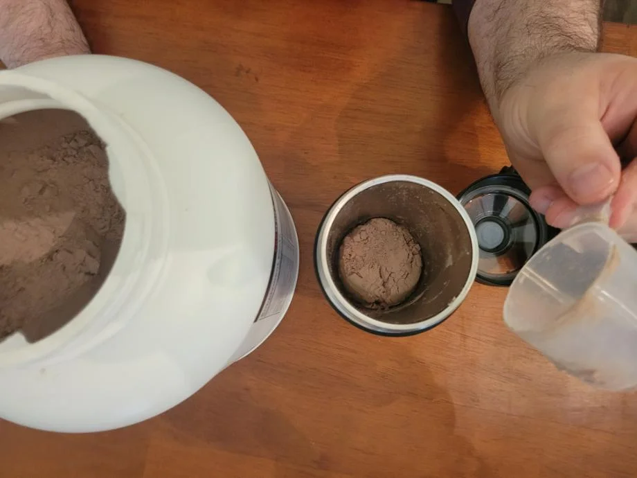 Muscle Milk Pro Series protein powder inside a shaker cup