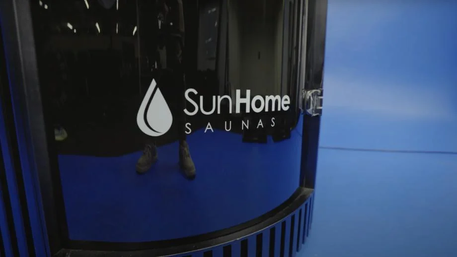 The logo on a Sun Home Pod Sauna