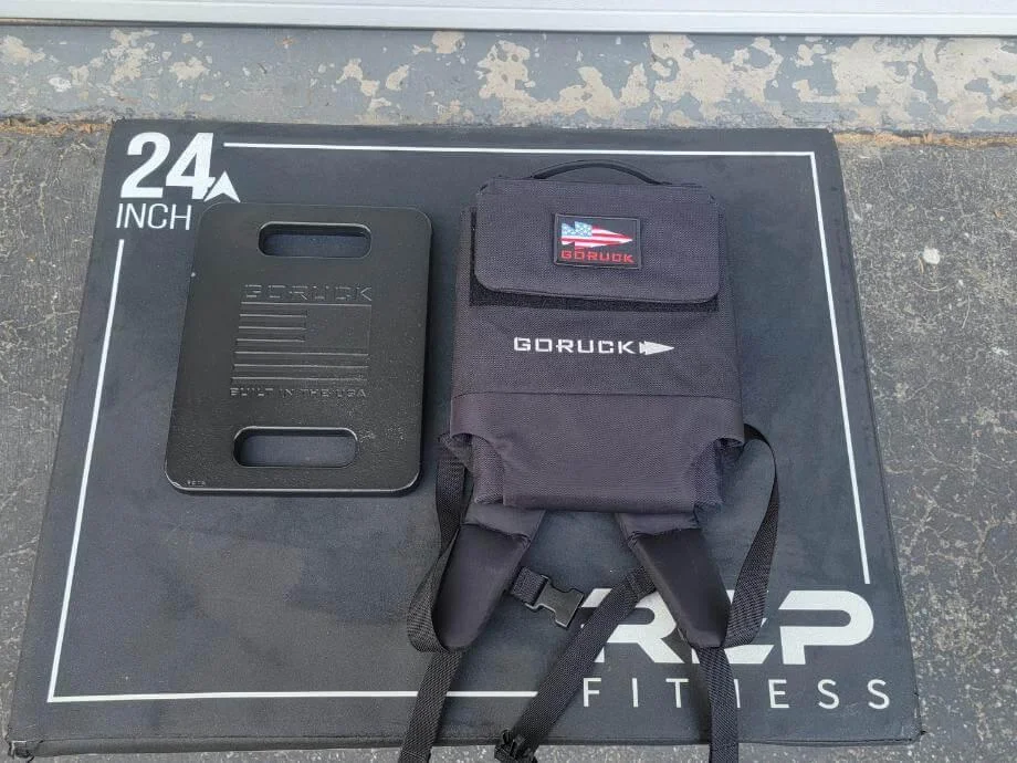 GORUCK Plate Carrier 3.0 and weight plate on plyo box