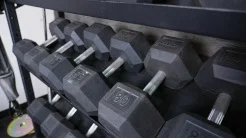 A rack full of Rep Fitness Hex Dumbbells