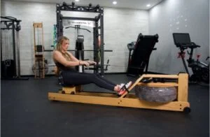 woman rowing on waterrower original