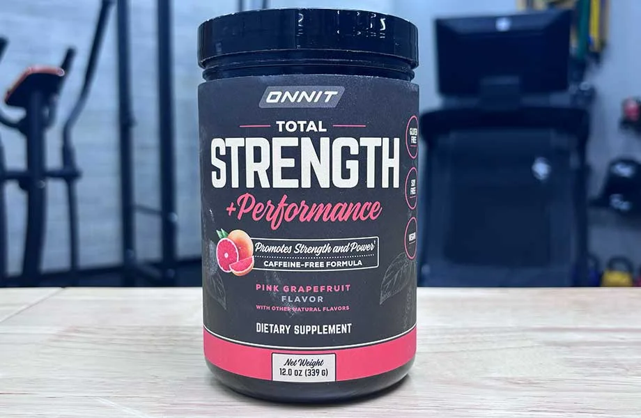 Container of Onnit Total Strength + Performance pre-workout