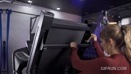 The Sole F63 treadmill unfolding.