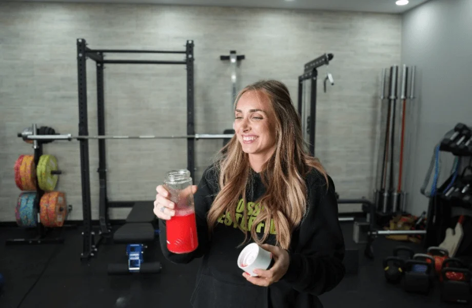 Our tester smiling after taking a sip of Optimum Nutrition Gold Standard Pre-Workout