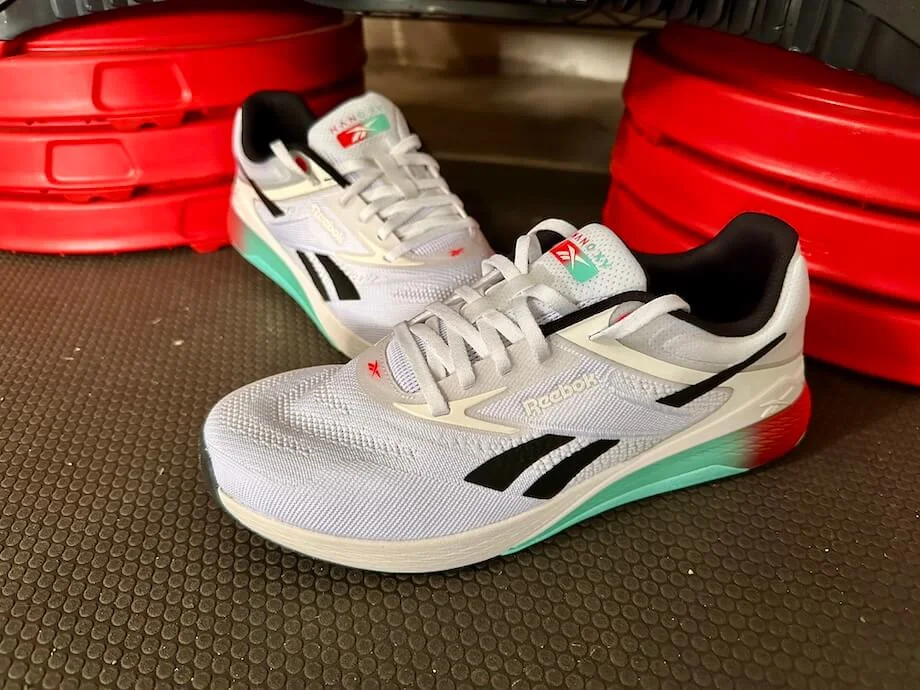 The Reebok Nano X5 training shoes sitting near an agility platform