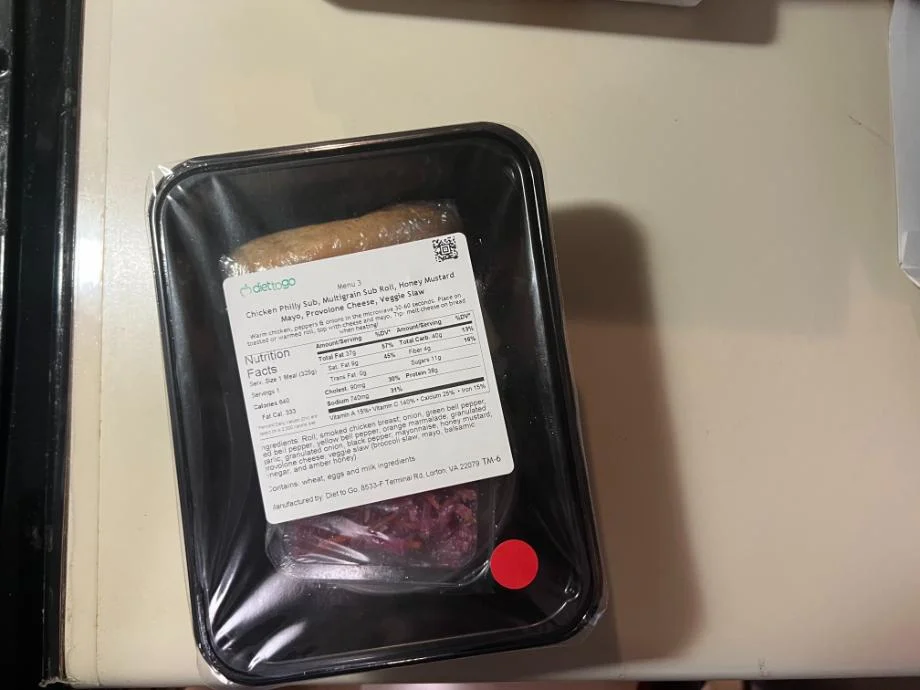 A cheesesteak meal is shown from the Freshology Meal Delivery Service